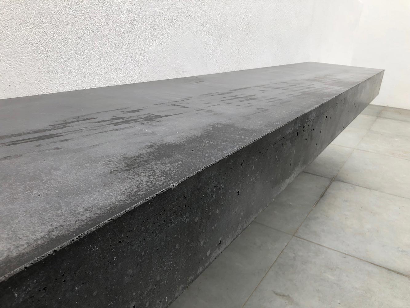 Concrete bench in a Calgary garden