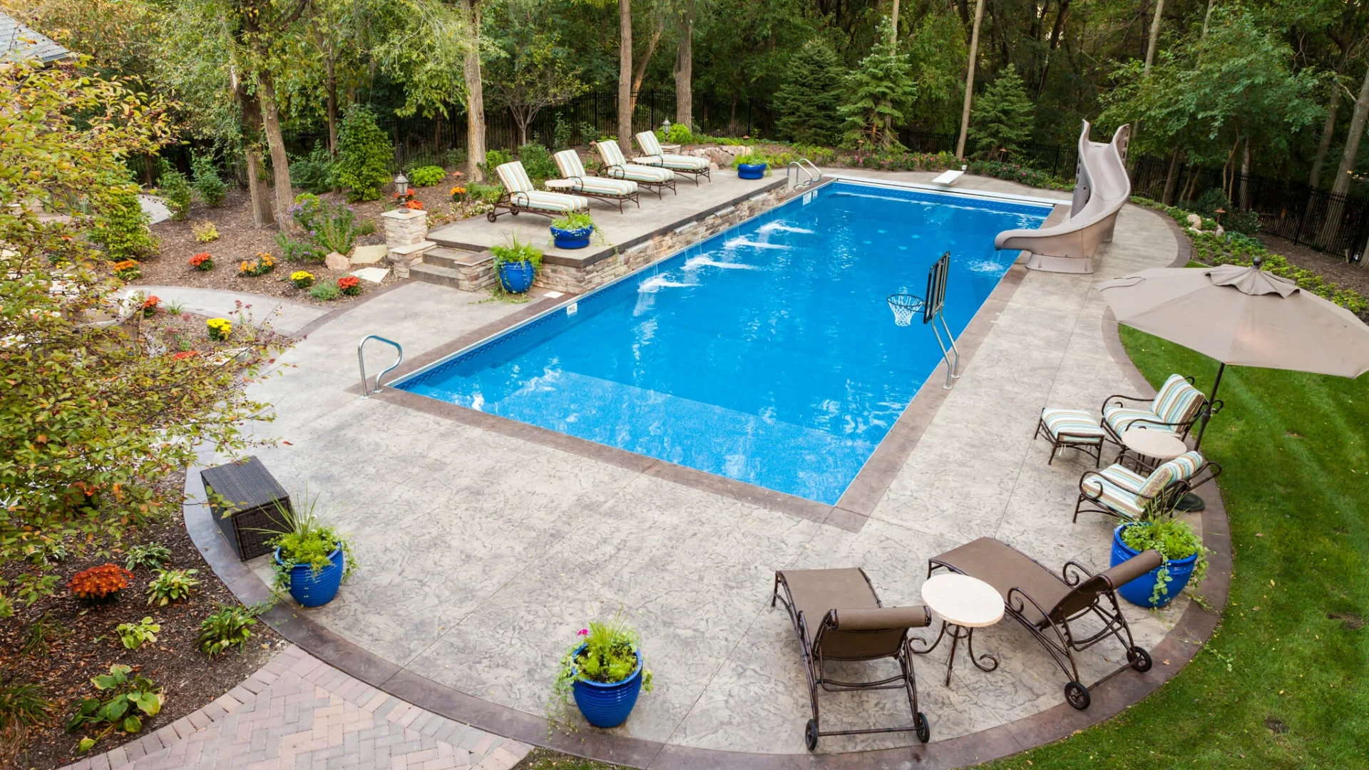 Stamped Concrete Pool Decks Ideas for Calgary Backyards