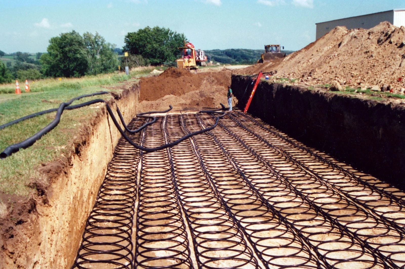 Geothermal heat pump heated driveway system