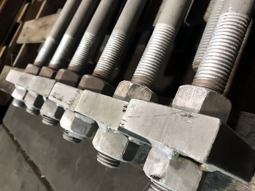 Anchor Bolt Setting Tolerances in Calgary: The Numbers Your Concrete Has to Hit Before the Steel Arrives